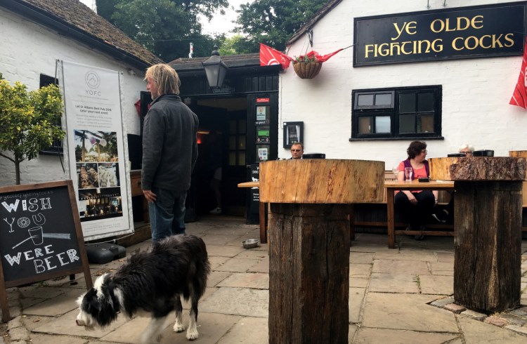 A customer surveys the offerings at Ye Olde Fighting Cocks in St. Albans, about an hour's drive north of London, which boasts more pubs per capita than any town in England.