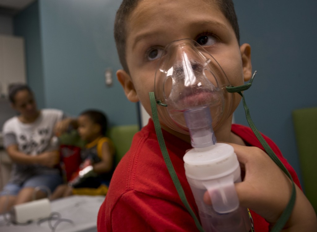 Yahir Garcia receives one of his two daily treatments for asthma at a medical center in San Juan, Puerto Rico. Asthma cases have jumped since Hurricane Maria.