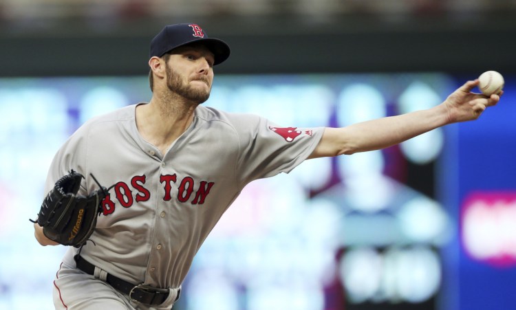 Boston's Chris Sale delivers a pitch against Minnesota on Tuesday in Minneapolis.