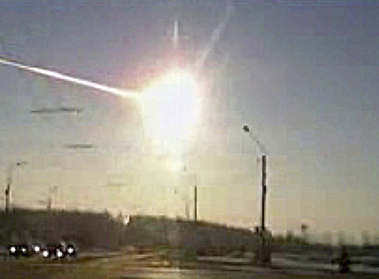 A dashboard camera captures a meteor streaking through the sky in Chelyabinsk, Russia, in 2013.