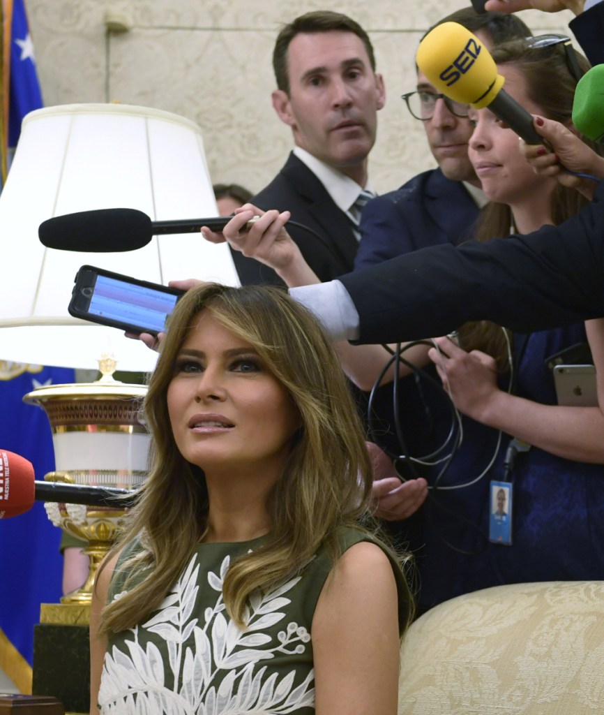 White House officials say first lady Melania Trump and the president's daughter, Ivanka Trump, pressured him to end the policy.