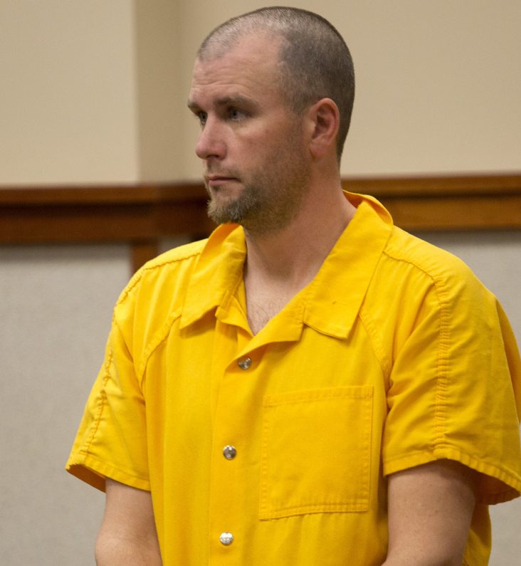 Travis Card appears in court for his arraignment on April 17 in Portland. He now faces as much as 20 years in prison and a $250,000 fine for each of 11 robberies or attempted robberies.
