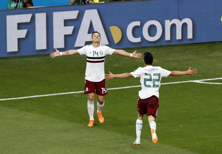 Mexico's Javier Hernandez, left, celebrates with teammate Hirving Lozano after scoring his teams second goal during the match between Mexico and South Korea at 2018 World Cup at Rostov Arena in Russia on Saturday.