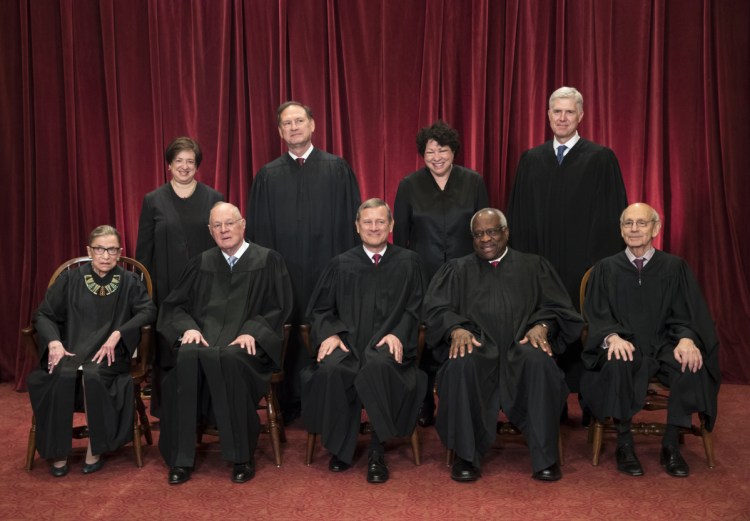 The justices of the U.S. Supreme Court gather for an official group portrait in 2017. Seated, from left are, Associate Justice Ruth Bader Ginsburg, Associate Justice Anthony M. Kennedy, Chief Justice John Roberts, Associate Justice Clarence Thomas, and Associate Justice Stephen Breyer. Standing, from left are, Associate Justice Elena Kagan, Associate Justice Samuel Alito Jr., Associate Justice Sonia Sotomayor, and Associate Justice Neil Gorsuch. The 81-year-old Kennedy said Wednesday that he is retiring after more than 30 years on the court.