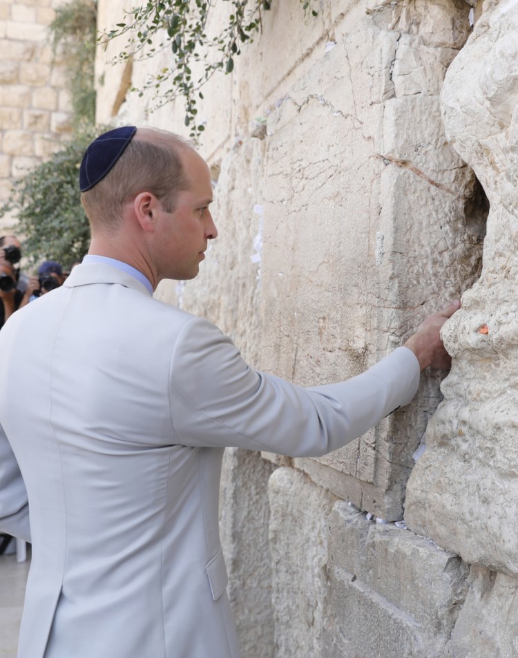 Britain's Prince William, Duke of Cambridge, touches the Western Wall in the Old City of Jerusalem on Thursday.
