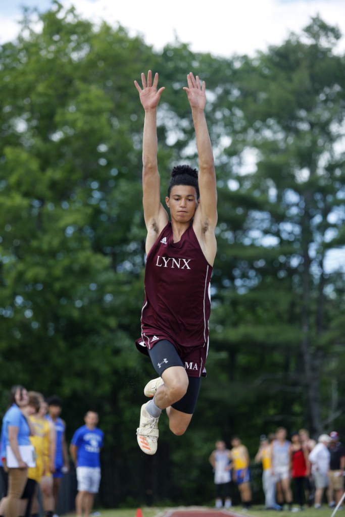 WATERBORO, ME - JUNE 2: Cayden Spencer-Thompson of Mattanawcook competes in the triple jump at the Class C state championship track meet. (Photo by Derek Davis/Staff Photographer)