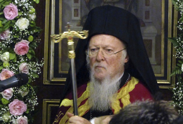 Ecumenical Patriarch Bartholomew takes part in a service at the church of saint Nicholas on the island of Spetses, Greece, on Wednesday. The spiritual leader of the world's Orthodox Christians hosted an environmental conference to seek backing from other religious leaders in a global campaign to take action against climate change.