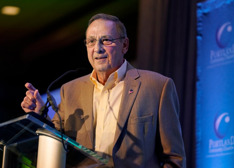 Gov. Paul LePage, seen speaking in Portland in June, said Monday, "I have a house in Florida. I will pay no income tax and the house in Florida's property taxes are $2,000 less than we were paying in Boothbay. ... At my age, why wouldn't you conserve your resources and spend it on your family instead of on taxes?"