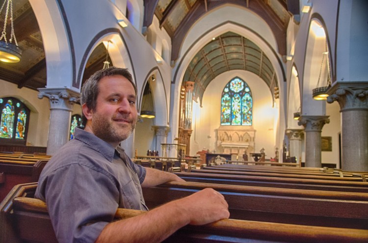 Adam F. Turner sits in the former St. Mark's Episcopal Church on Friday in Augusta.