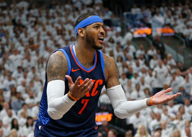 Carmelo Anthony won't leave Oklahoma City, instead deciding to accept his $28 million option and remain with the Thunder.