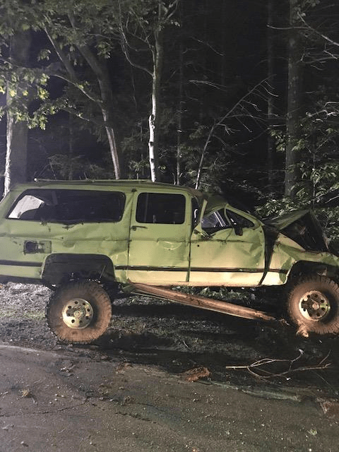 The wrecked Suburban found off Route 109 in Acton.