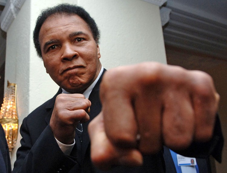 Muhammad Ali poses at the World Economic Forum in Davos, Switzerland, in  2005. He refused to report for induction into the U.S. military during the Vietnam War.