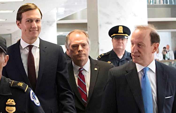 James A. Wolfe, the longtime director of security for the Senate Intelligence Committee, center, walks with Jared Kushner, left, after a closed-door interview with Senate Intelligence Committee investigators on July 24, 2017.   J. Abbe Lowell, a well-known Washington criminal defense attorney, is at right. 