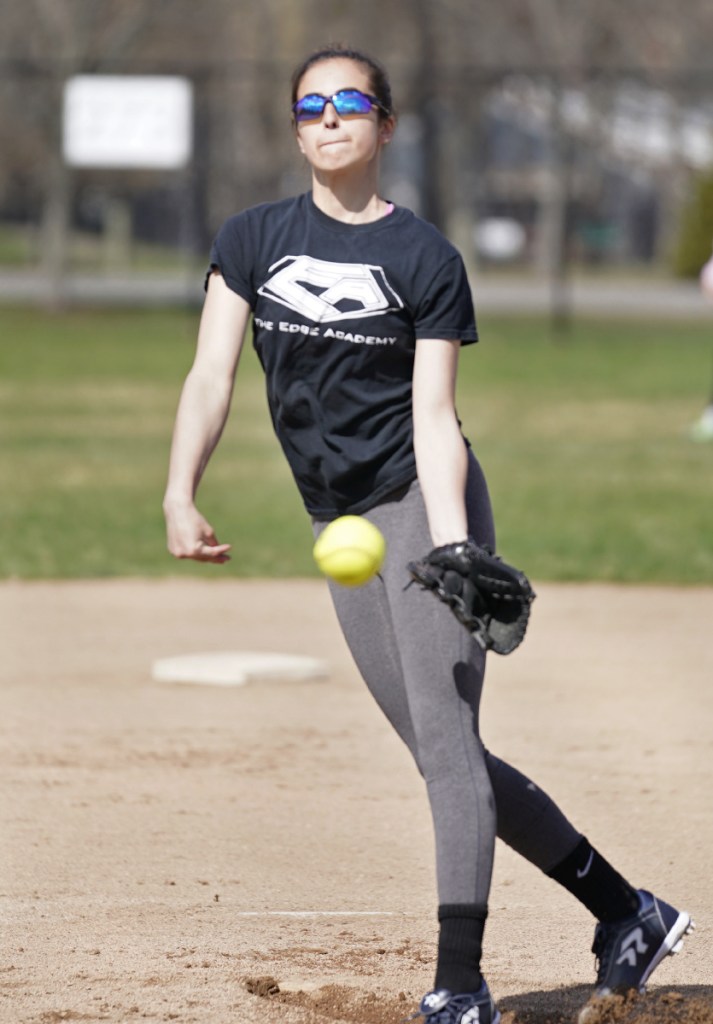 PORTLAND, ME - MAY 2: Portland High School senior Jess Brown practices pitching at Payson Park in Portland on Wednesday, May 2, 2018. Brown has learned to put a spin on the ball, curving it to keep batters guessing. She had 134 strikeouts last year with a 1.29 ERA. (Staff Photo by Gregory Rec/Staff Photographer)