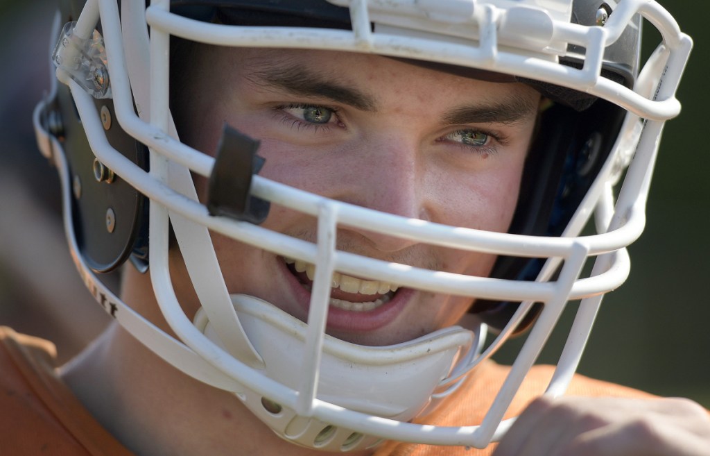 Staff photo by Andy Molloy 
 Gardiner safety Kolton Brochu laughs during practice Tuesday at the high school.