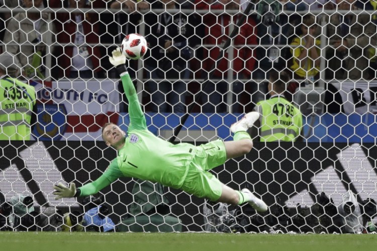 England goalkeeper Jordan Pickford saves a penalty during the round of 16 match between Colombia and England on Tuesday in Moscow. England advanced on penalty kicks.