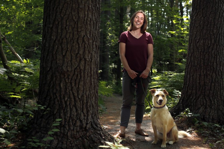 Betsy Cook with her dog Banjo in Canco Woods.
