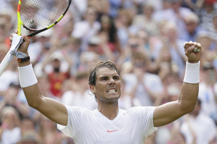 Rafael Nadal celebrates after defeating Mikhail Kukushkin in their second-round match Thursday at Wimbledon. Nadal won in straight sets, 6-4, 6-3, 6-4.