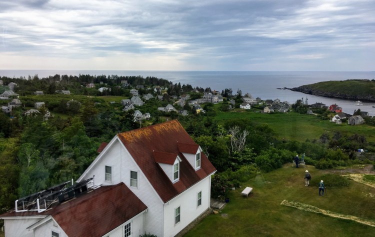 The view from the lighthouse looks down on the Monhegan Museum. The museum opens the lighthouse to the public occasionally. 