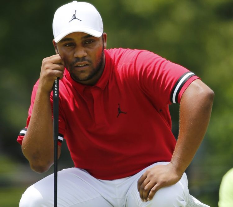 Harold Varner III shoy a 4-under 66 to grab a share of the lead at the Military Tribute at The Greenbrier on Saturday.