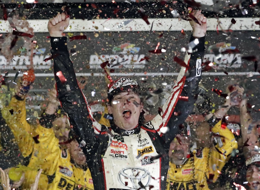 Erik Jones celebrates after picking up his first career NASCAR Cup Series victory Saturday night at Daytona International Speedway.