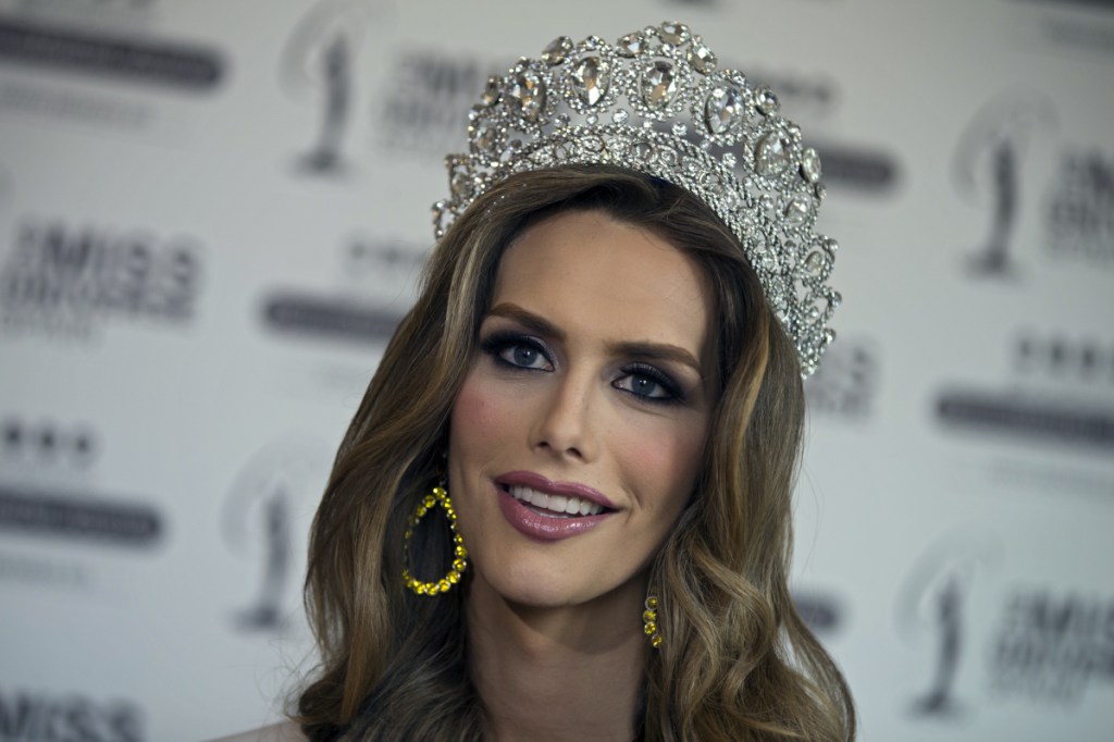 Angela Ponce, who won Spain's Miss Universe competition in June, speaks during an interview in Madrid, Spain. The first transgender woman to compete in the global Miss Universe pageant says that whether or not she wins the beauty title, she wants to make history as a role model for trans children around the globe. (AP Photo/Paul White)