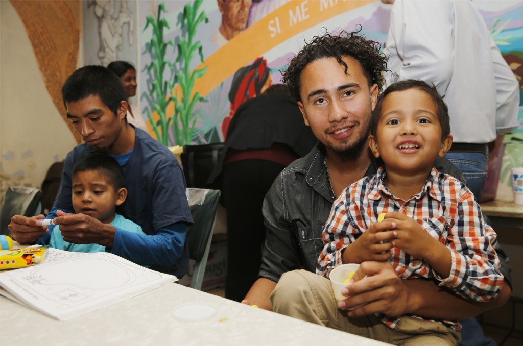 Roger Ardino, 24, and his son Roger Ardino Jr., 4, and Pablo Ortiz, 28, left, and his son Andres, 3, speak to the media in El Paso, Texas, on Wednesday. Ardino and Ortiz were reunited with their sons Tuesday night after months of separation.