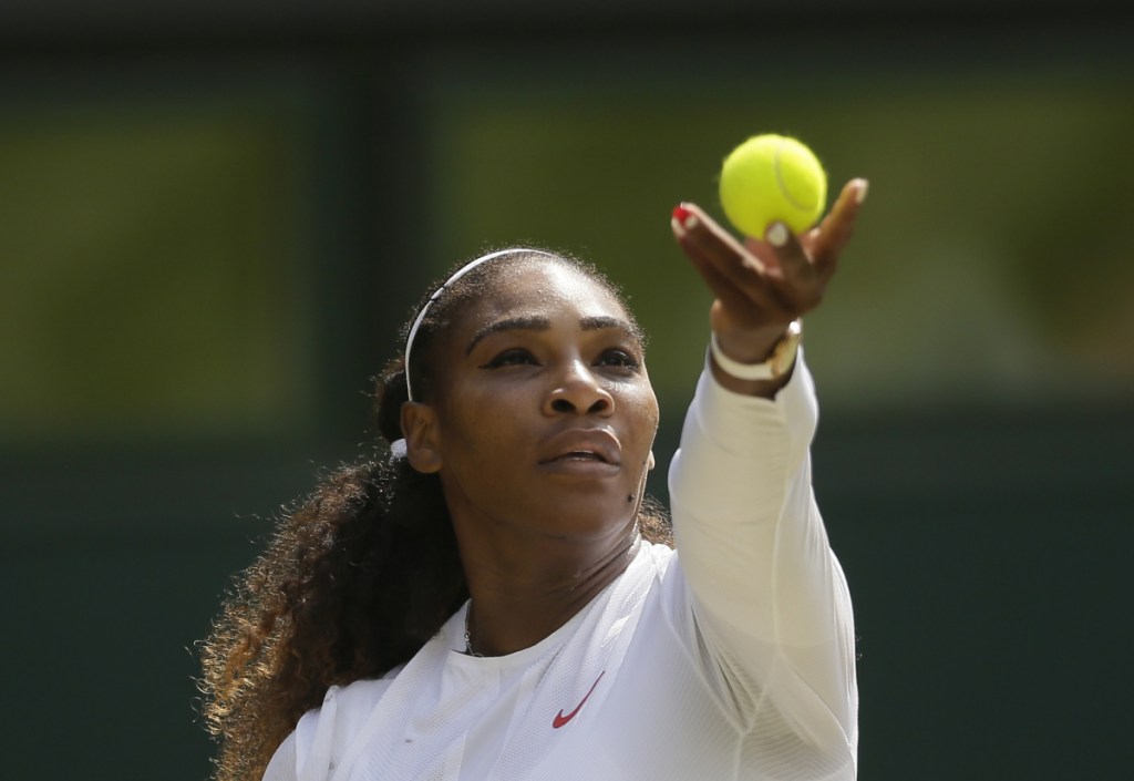 Serena Williams serves to Germany's Julia Gorges during their semifinal match at the Wimbledon Tennis Championships in London on Thursday. Williams advanced to Saturday's final with a 6-2, 6-4 victory. (AP Photo/Tim Ireland)
