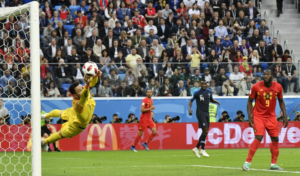 France goalkeeper Hugo Lloris, deflecting a shot by Belgium in the semifinals, wants his team to go one step further than the 2016 European Championships, when it lost in the final.