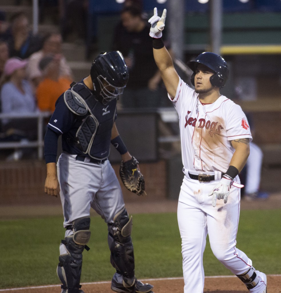 Michael Chavis, playing at Hadlock Field for the first time this season following an 80-game suspension, celebrates Thursday night after hitting a home run against the New Hampshire Fisher Cats.