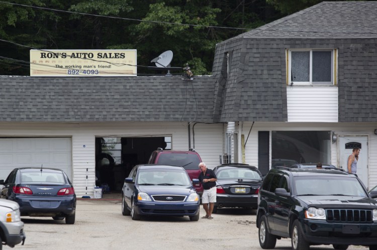 An informant and witnesses told authorities that sheets of counterfeit money were being printed in the downstairs office of Ron's Auto Sales, a used car dealership in Windham.