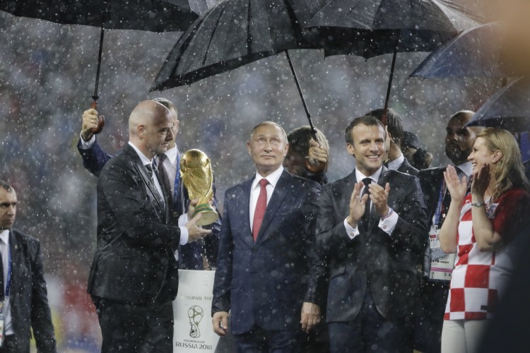 From left, FIFA President Gianni Infantino, Russian President Vladimir Putin, French President Emmanuel Macron and Croatian President Kolinda Grabar-Kitarovic attend the  awards ceremony at the World Cup, which Russia hosted.