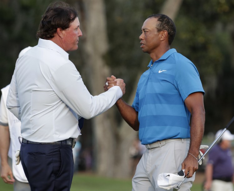Phil Mickelson, left, and Tiger Woods, who have combined to win one golf tournament since the end of 2013, may be looking to remain relevant with a television showdown.