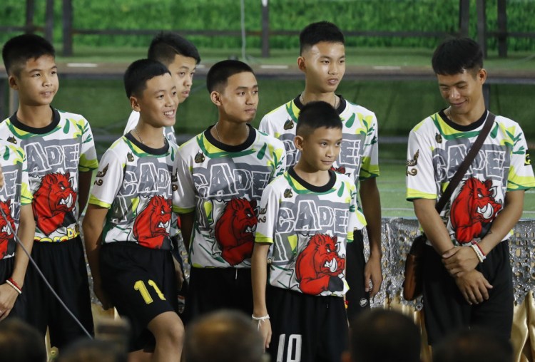 Members of the rescued soccer team discuss their experience being trapped in the cave in Chiang Rai at a press conference on Wednesday.