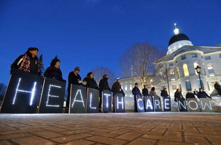 Medicaid expansion advocates rally in Augusta before Gov. Paul LePage's address to the state in February. The governor has opposed the expansion that was approved by vorers.