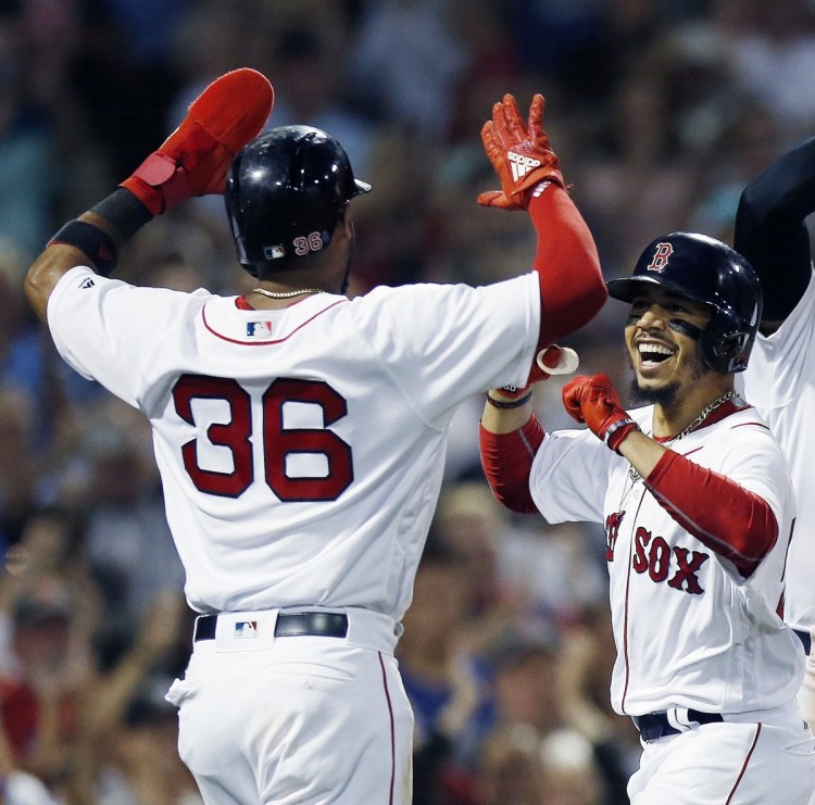 Boston's Mookie Betts has the best batting average in the majors (.359), and also leads in slugging and on-base percentage. He has helped the Red Sox to a 68-30 record and a 4 -game lead over the Yankees in the AL East.
