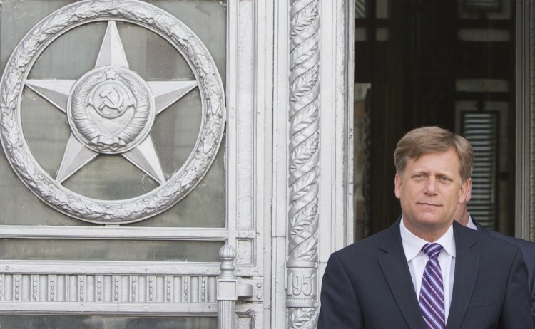 Ambassador to Russia Michael McFaul leaves the Foreign Ministry in Moscow in 2013. McFaul recounts in a book how he was harassed by Russian authorities.