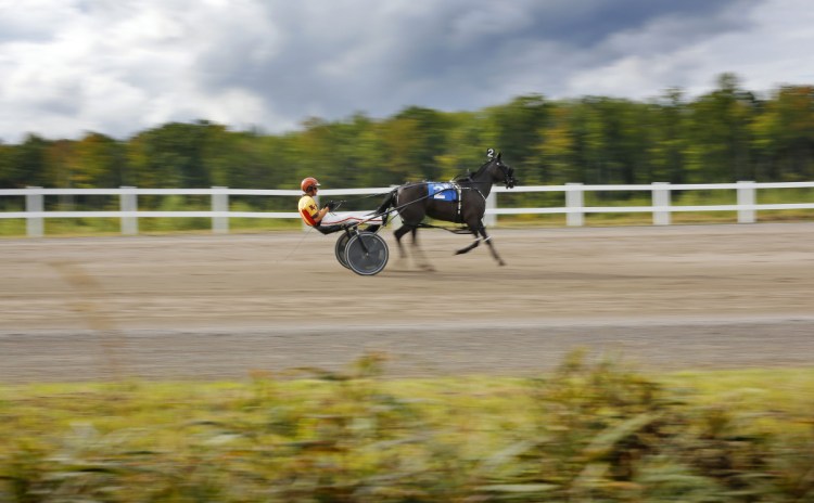 Driver Nick Graffam of Falmouth goes around the track at the Oxford County Fair in 2016. The Bangor Raceway is picking up several of the days drivers will lose in Oxford.