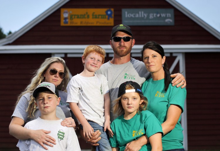 Seen at the late patriarch's farm in Saco, members of the Grant family include, clockwise from bottom left, Cameron O'Donnell, Vanessa Grant, Richard Grant, Ben Grant, Julie Grant and Neveah Hagerman. A dispute over the estate forced the sale of the property.