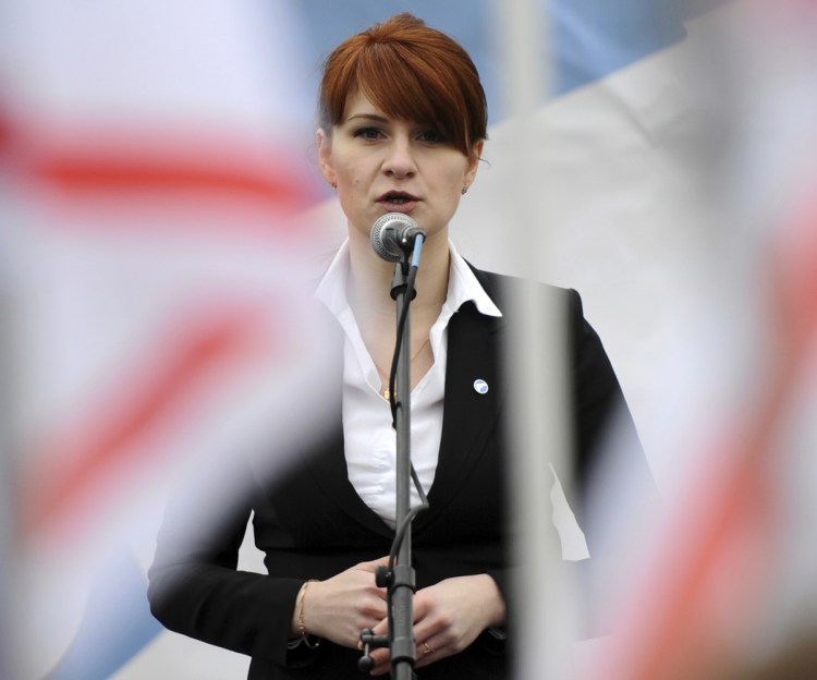 Maria Butina, leader of a pro-gun organization in Russia, speaks to a crowd during a 2013 rally in support of legalizing the possession of handguns in Moscow, Russia. Butina, a 29-year-old gun-rights activist, served as a covert Russian agent while living in Washington, gathering intelligence on American officials and political organizations and working to establish back-channel lines of communications for the Kremlin, federal prosecutors charged Monday.
