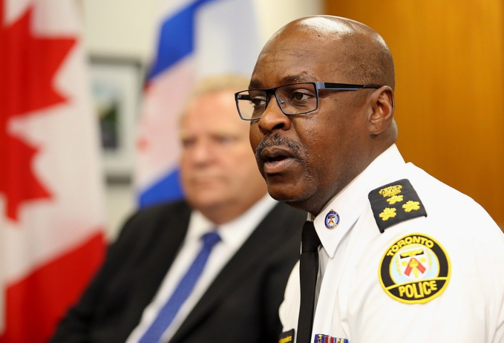 Toronto Police Chief Mark Saunders speaks at Toronto City Hall on Monday after a mass shooting in the city Sunday night. He said he would not speculate on a motive but did not rule out terrorism. A 10-year-old girl and an 18-year-old woman were killed.