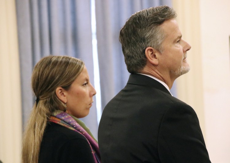 Jill Lamontagne, 30, with her attorney Scott Gardner, on the first day of her trial Monday at York County Superior Court in Alfred. 