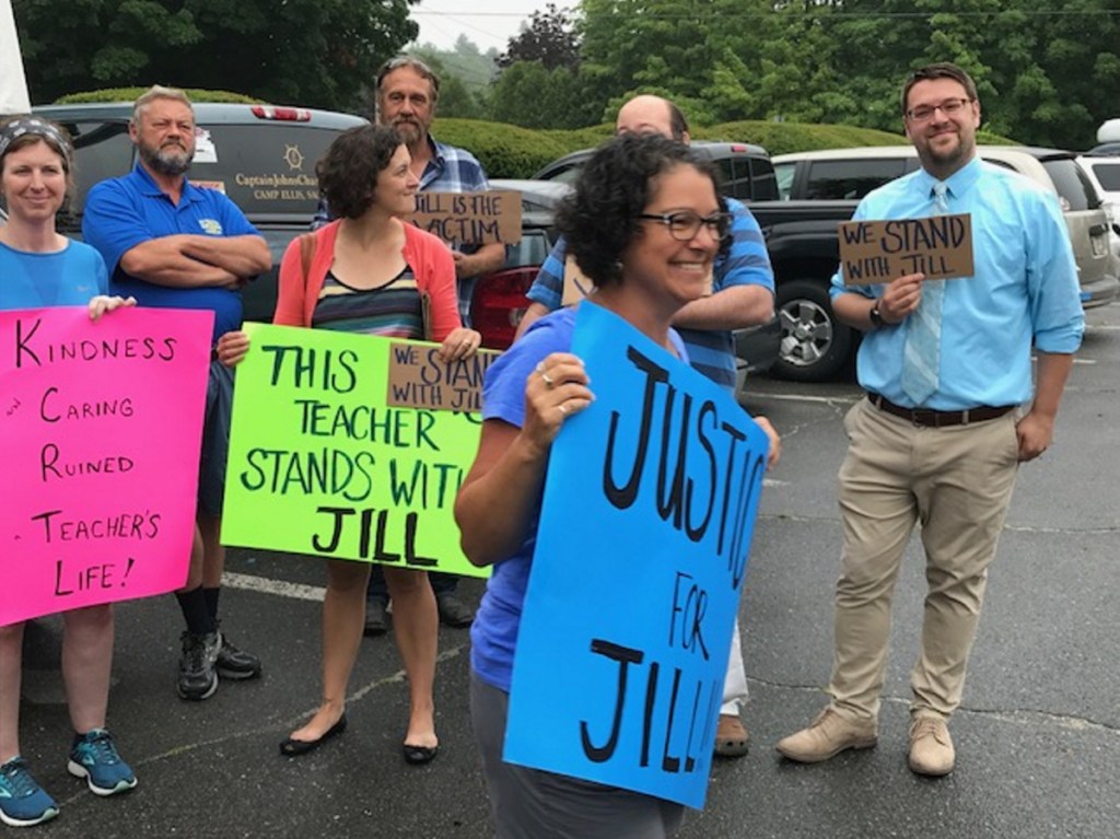 Teachers show their support for former Kennebunk High School health teacher Jill Lamontagne outside York County Superior Court in Alfred on Monday.