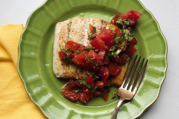 Pick your favorite mild white fish and top it with a tomato basil mixture, similar to what you'd put on top for bruschetta.