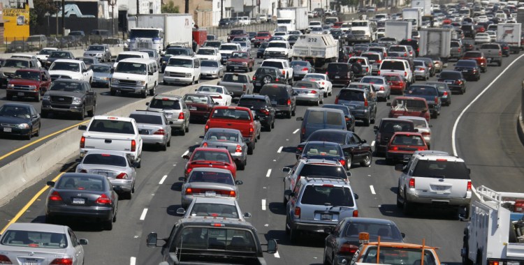 Bumper-to-bumper traffic moves through Los Angeles in 2006. The Trump administration has taken aim at California and 12 other states, including Maine, that have been allowed to set their own rules for limiting greenhouse gases from vehicles.