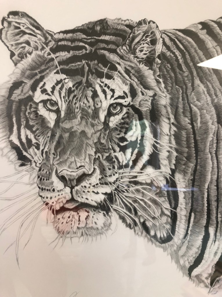 Neal Caron of Oakland had several works on display, including  a graphite drawing of a tiger. He said his artwork and poetry give him an escape from memories of his time as a Navy medic. "I lose myself in the art and in the words, and it is therapy for me, and I can see how it can be for others," he says.