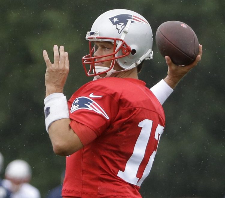 New England Patriots quarterback Tom Brady throws a pass during practice on Thursday.