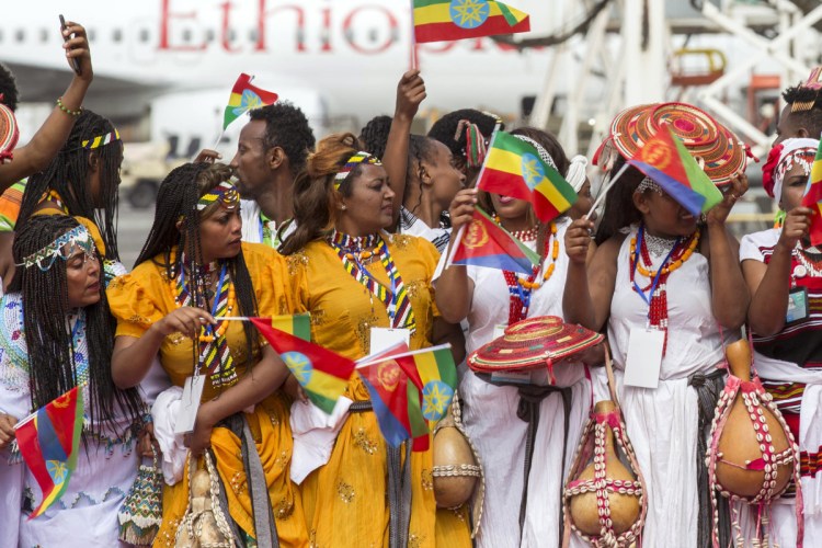 Ethiopian women gather at Addis Ababa International Airport this month to welcome Eritrean President Isaias Afwerki for an unprecedented visit. 