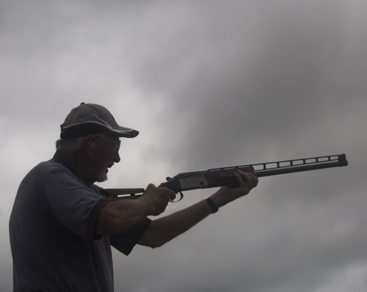Cal Stinson Jr., a 90-year-old champion trap shooter, competes in the 128th annual Maine State Trapshooting Championship at the Scarborough Fish and Game Association. Stinson has been shooting since 1947.