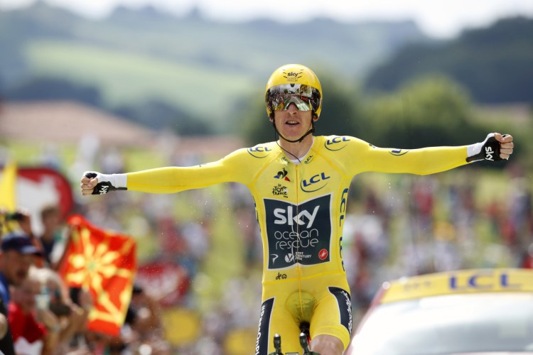Britain's Geraint Thomas, wearing the overall leader's yellow jersey reacts as he crosses the finish line in Espelette, France on Saturday.